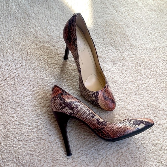 Calvin Klein Shoes - Calvin Klein size 7 Whinnie snake skin pumps